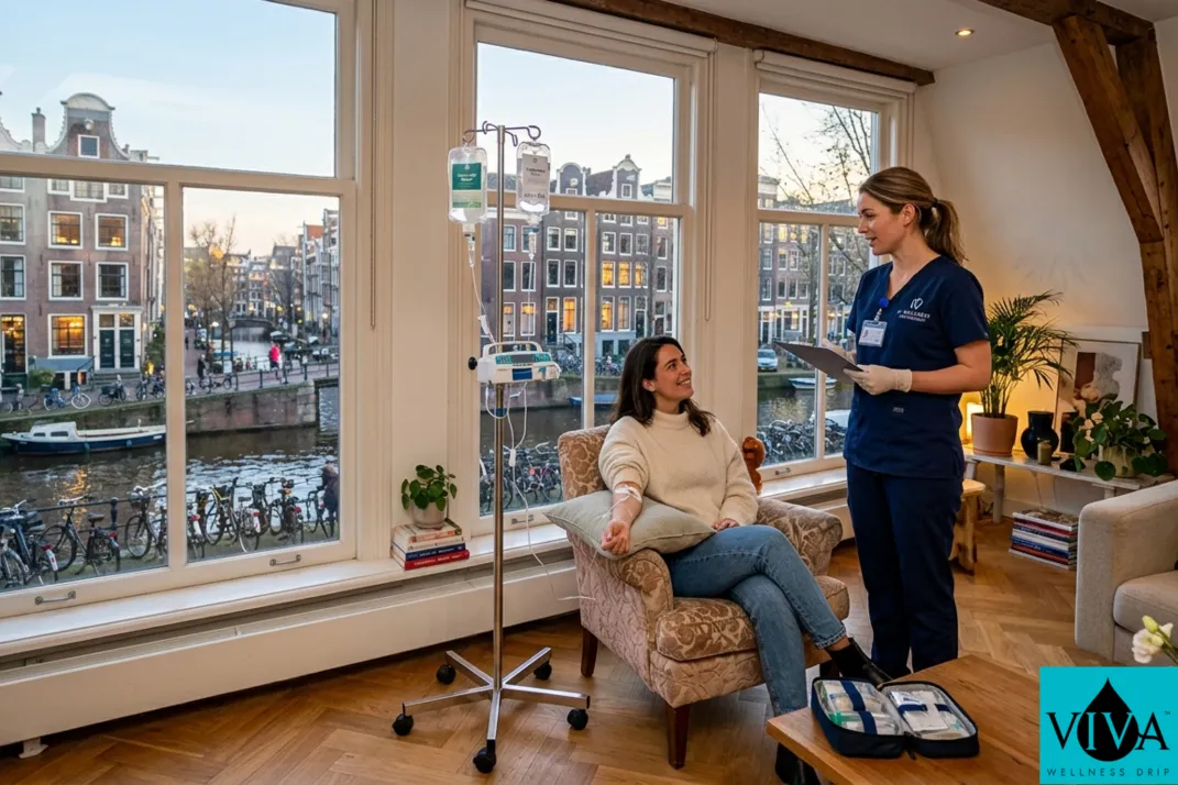 Mobile IV drip therapy session set up in a light-filled Amsterdam canal house apartment with views of the Jordaan and bicycles below