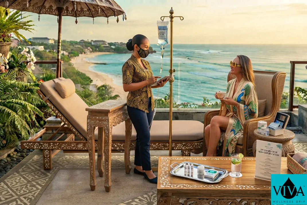 A mobile IV drip therapy session set up on a private resort terrace overlooking the beach in Nusa Dua, Bali